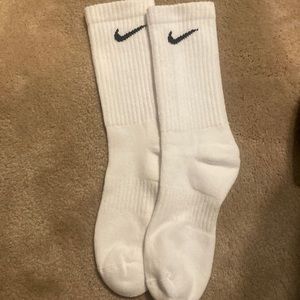1 pair of White, never worn Nike socks
